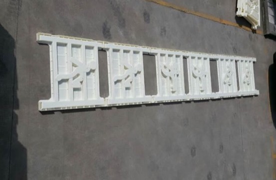 long bridge railing panel row mould with repeated decorative and I-beam openings